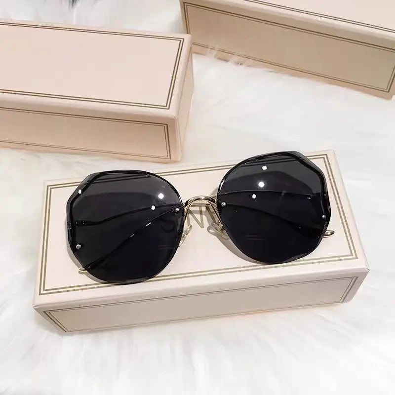 3. accessori - Occhiali da sole da donna senza montatura oversize